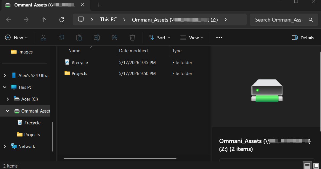 Viewing the mapped Ommani_Assets network drive in Windows File Explorer